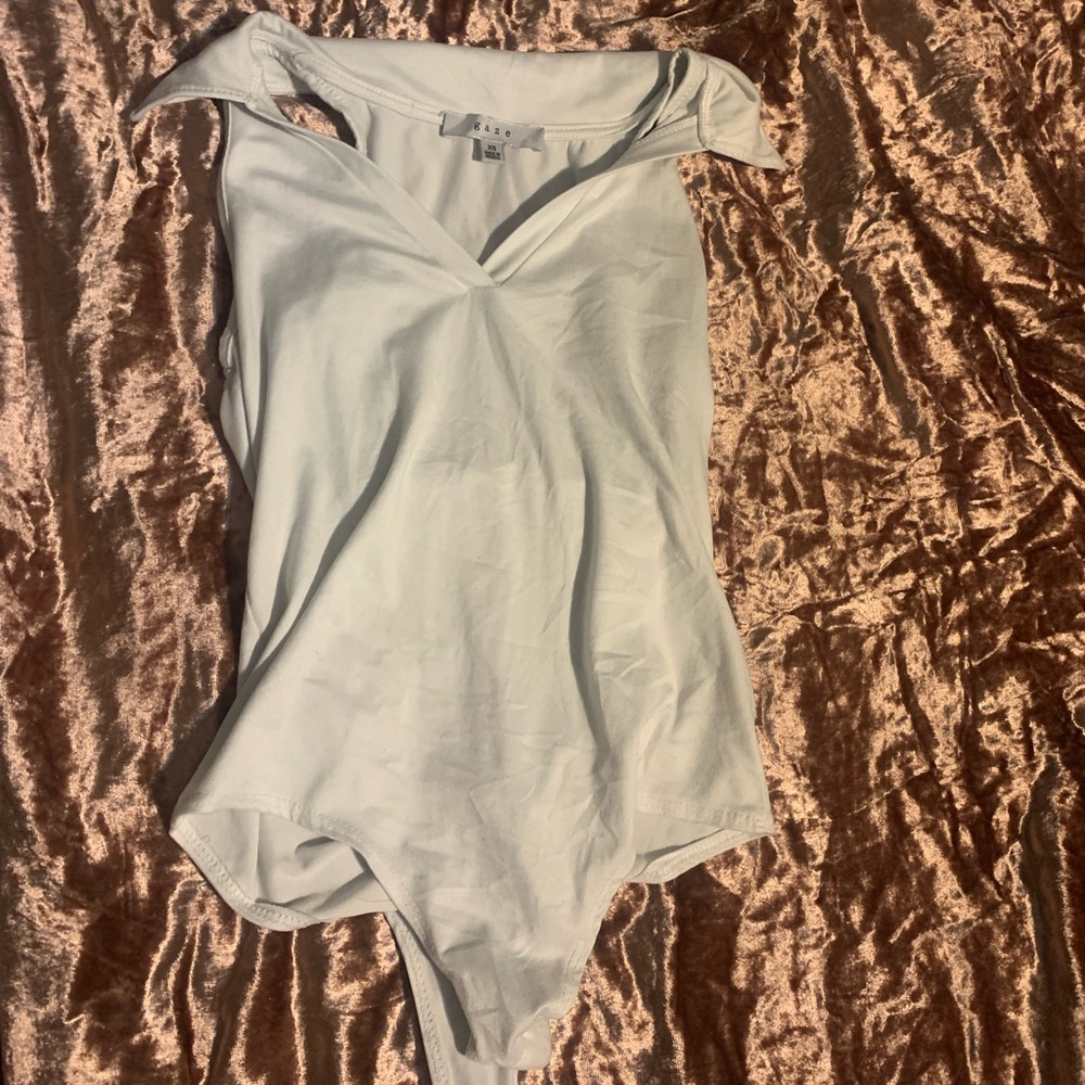 Sleeveless White Body Suit 🤍
